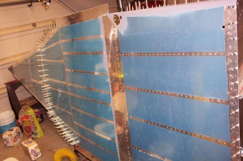 Almost done with the bottom rivets!