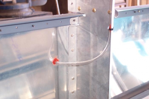 Tubing RTV'd on Vans pop rivet