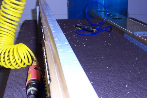 Machine countersink a bunch of holes.  Primed the holes with self etching primer