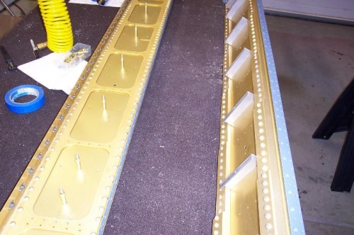 Rear attach plates being back drilled