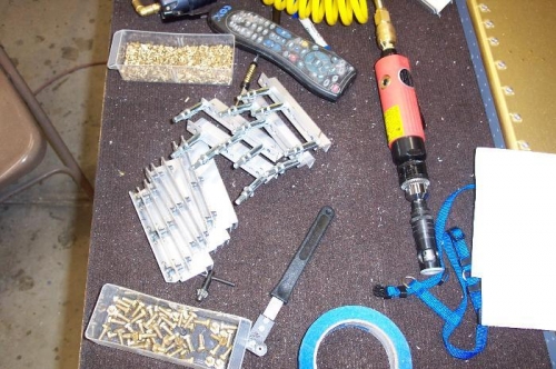 Riveting nut plates, note the cool plate nut drill guide from ATS.