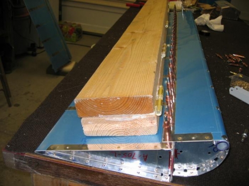 Keeping the Aileorn straight while I finish the riveting.