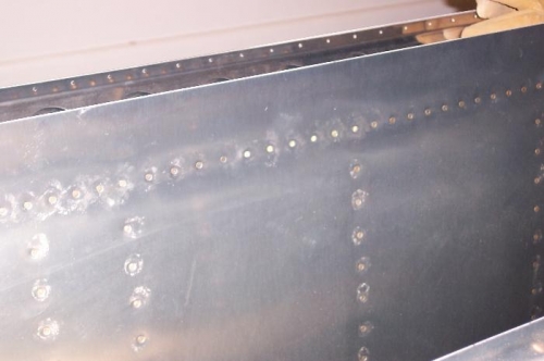 Replaced about 20 rivets along the TE of the Left wing.