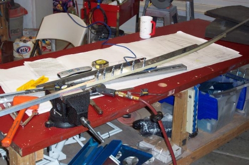 Drilling the 721 stiffener to the longeron.